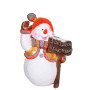 Сніговик з табличкою Різдво